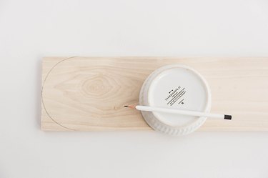 Trace your ramekin on the edge of the wood board.