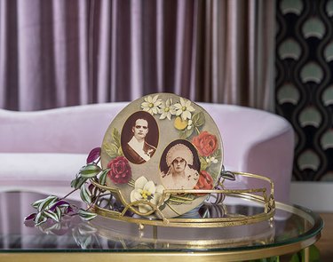 Portraits in frame on coffee table in Monica Orozco's living room