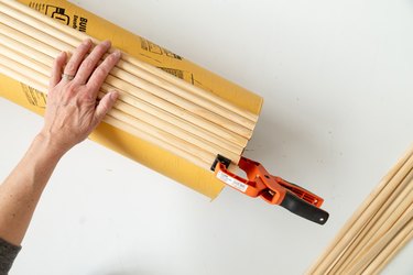 adding wood dowels to a tube for table DIY