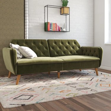 green tufted velvet sofa