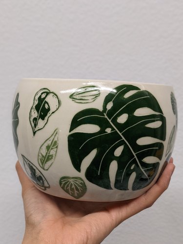 ceramic piece with leaf drawings