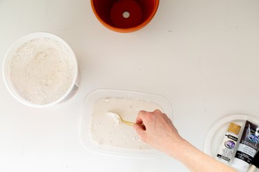 mixing plaster for DIY aged terra cotta pots