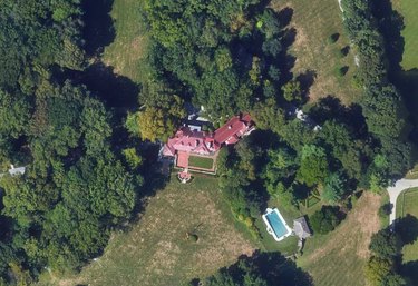 satellite view of red-roofed house