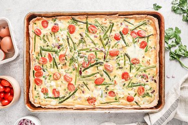 Bake sheet pan quiche for 30 minutes
