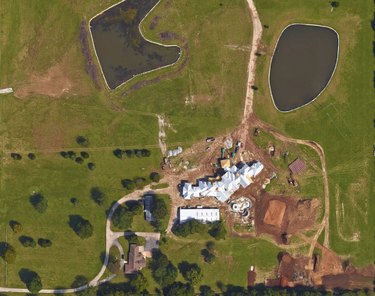 satellite view of house and two ponds