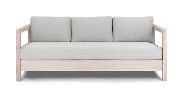 gray sofa with light wood frame