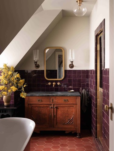 traditional bathroom with purple and rust tile