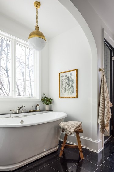 industrial pendant hanging over bathtub