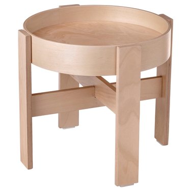 A light wood side table with an inset tabletop.