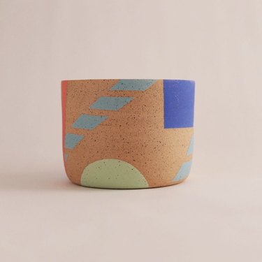 Wheelthrown Planter  Raw speckled stoneware clay with handpainted Memphis Design inspired geometric patterns. Drainage hole included.