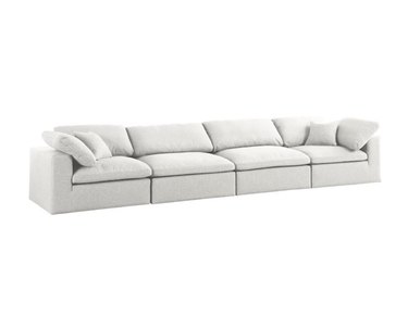 four-seater white sofa