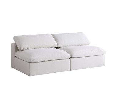 armless sofa in linen cream