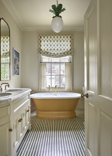 bathroom lighting idea with green top and white shade