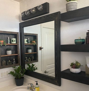 Medicine cabinet converted into nook of shelves.