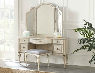 White vanity set with mirror and bend
