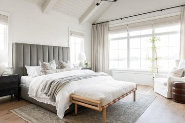 Bedroom with layers of pewter, gray, cream and white.