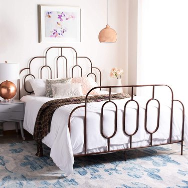 bronze detailed bed frame