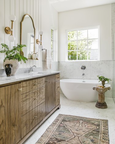 modern farmhouse bathroom idea in warm neutrals with vintage accents