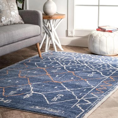blue area rug with pattern