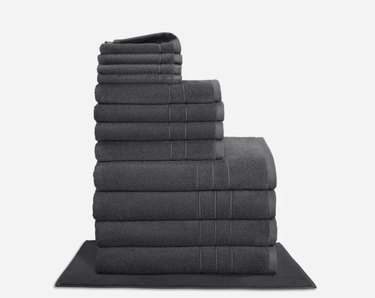 Stack of dark gray bath towels.