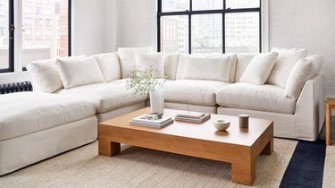 white sectional in airy living room