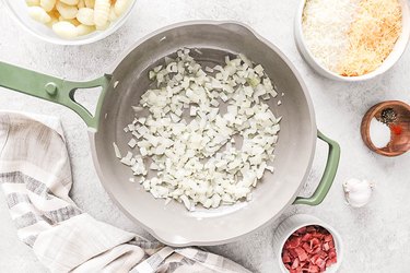 Diced onion and garlic in a skillet