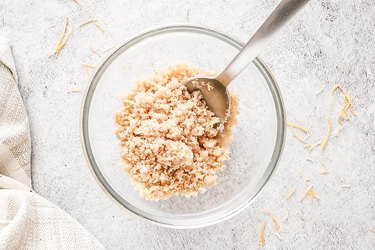 Breadcrumbs and spoon in a bowl