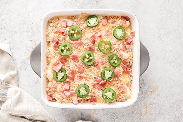 Jalapeño popper gnocchi casserole on a gray background