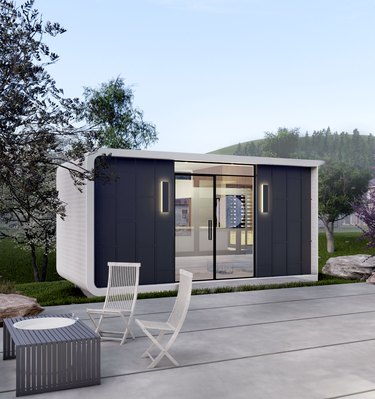 A rendering of a 3d printed home with large black doors and glass windows