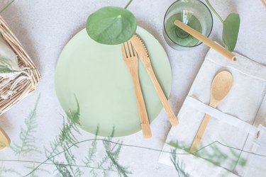 eco-friendly cutlery and straws on table