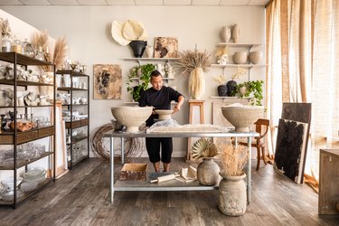 Dodie Sy at work in his studio