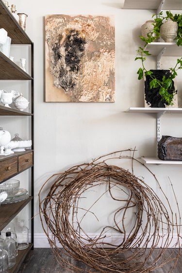 Shelves of pottery and plants