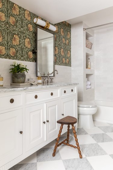 basement bathroom makeover with floral wallpaper