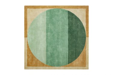 geometric green and tan rug