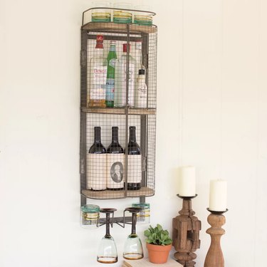 shelf on wall with alcohol