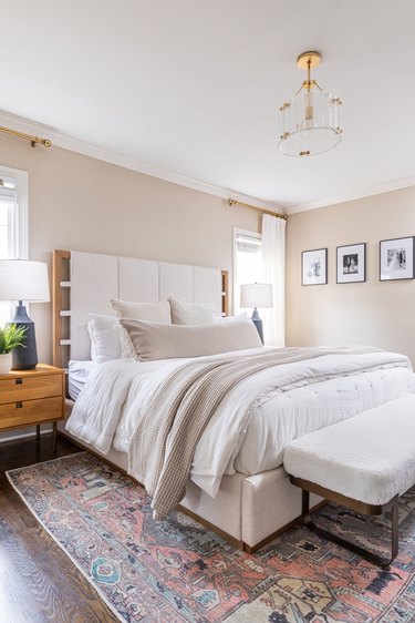 Beige bedroom with white bedding
