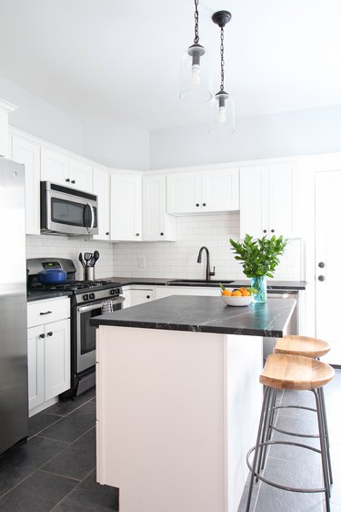 Soapstone kitchen countertops in modern white kitchen