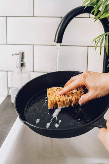 Rinse skillet with soap and water