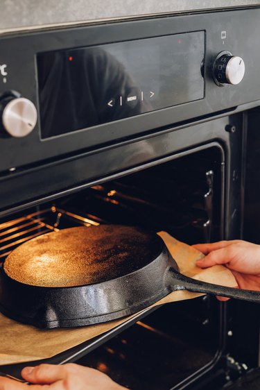 Put the skillet in the oven upside down