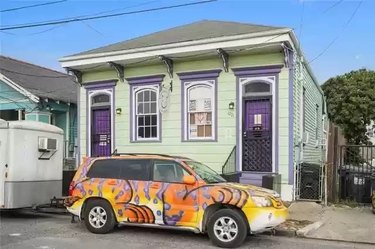 Crescent City Cat Club exterior and car