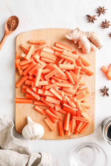 Carrot sticks on a cutting board