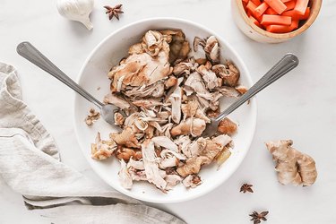 Shredded chicken on a white plate