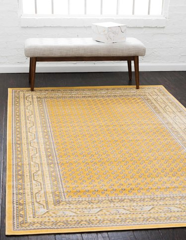 yellow patterned rug