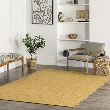 dark yellow rug in sitting room