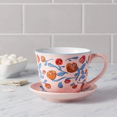 floral mug and saucer in pink tones