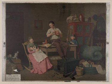 print of woman holding baby in rocking chair