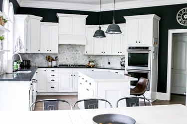 black walls with white cabinets