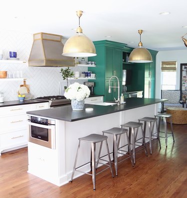 white cabinets with green cabinets