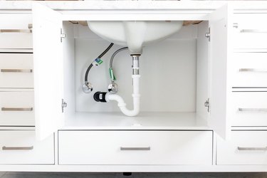 Flexible faucet supply lines under sink