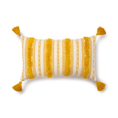 yellow tufted lumbar pillow